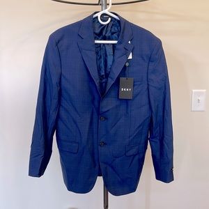 Brand new with tags Mens blue plaid DKNY sport coat. Size 44R.